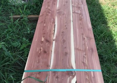 AA Farms & Sawmill | Canon, GA | cedar boards in grass